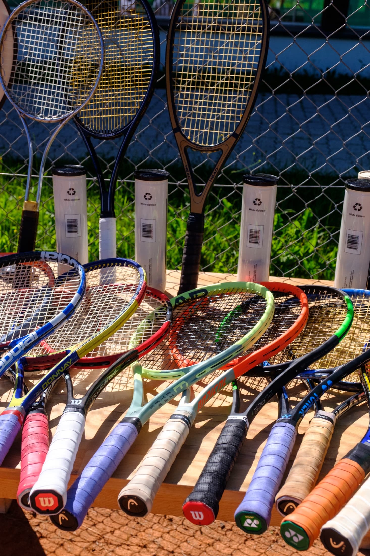 Original tennis racquets from different eras in the Golden Era collection